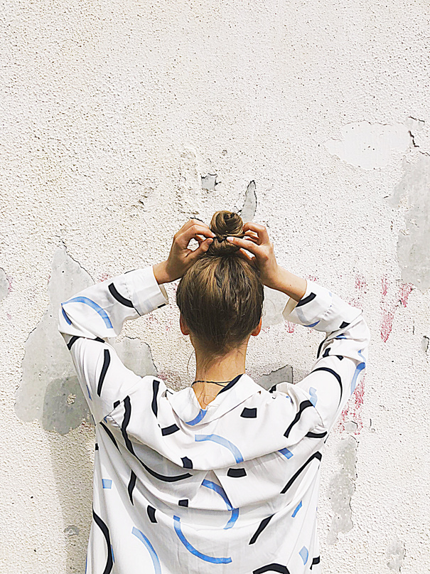 Woman Holding Pony Tail